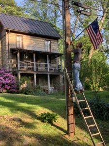 Putting out flags on Waterford village streets