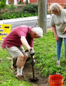 Cleaning out the drain at Patrick Street in Waterford Virginia